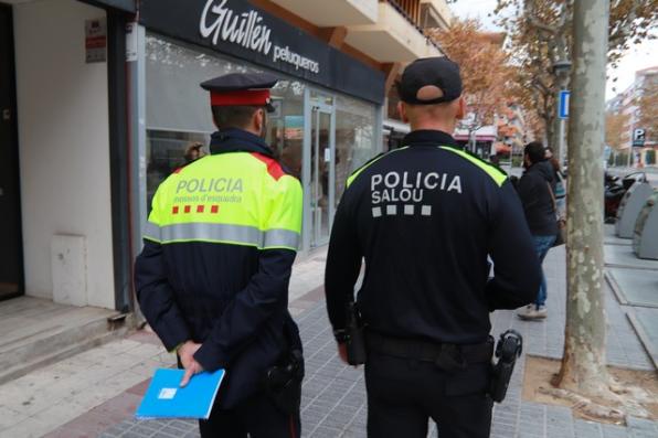 A police couple from both bodies touring the establishments.